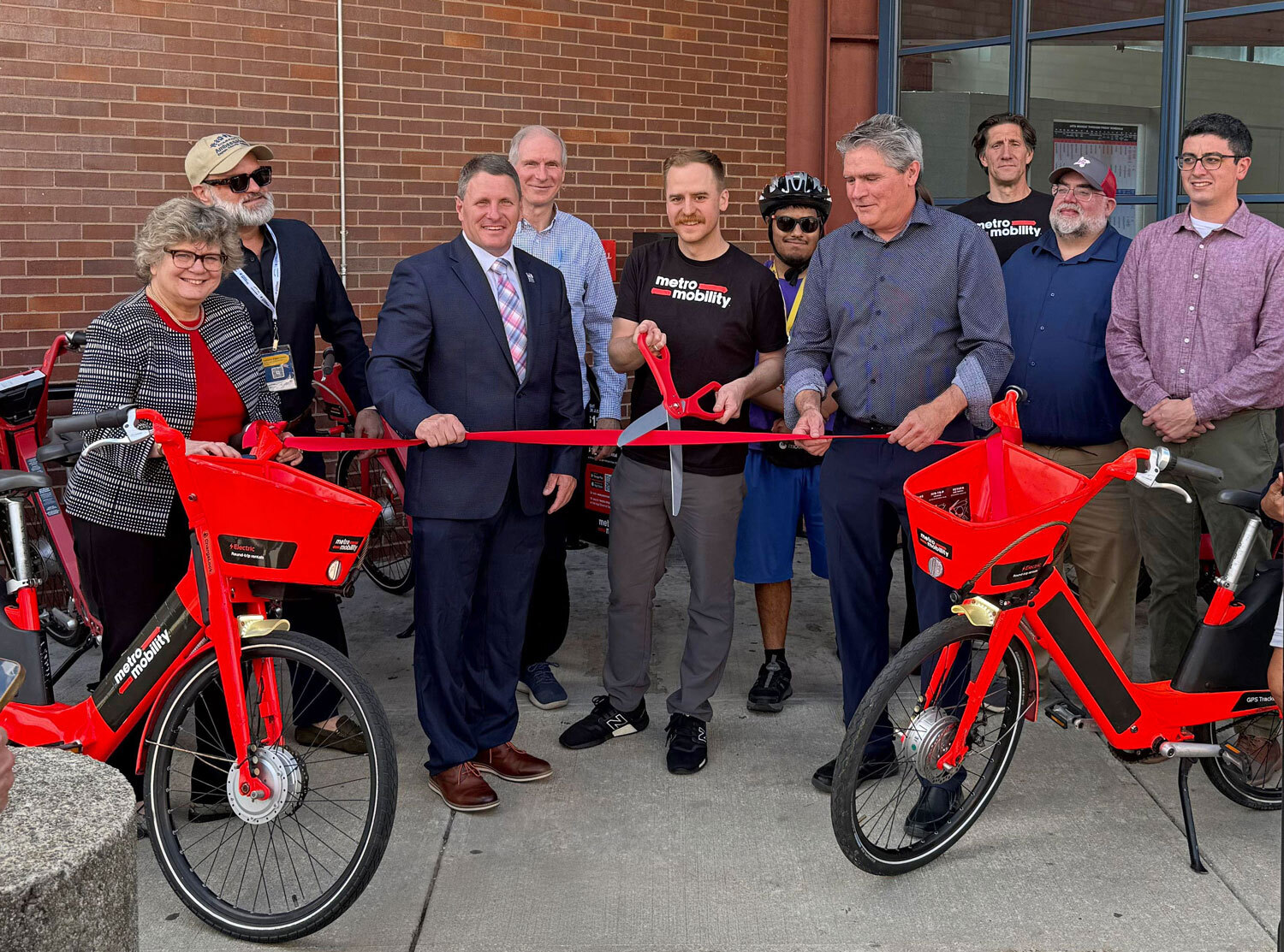 Ribbon-cutting for Metro Mobility's e-bike share program at the LRTA bus hub in Lowell